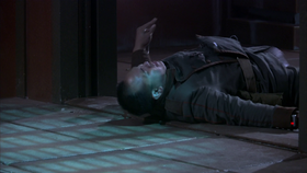 The Genii soldier is later killed in Atlantis' grounding station by Major John Sheppard when he was trying to ambush him (SGA: "The Storm").