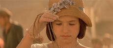 Young Catherine Langford takes the necklace when her father calls her (Stargate).