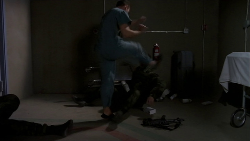 File:Charles Kawalsky's Goa'uld kicks the SF guard.png